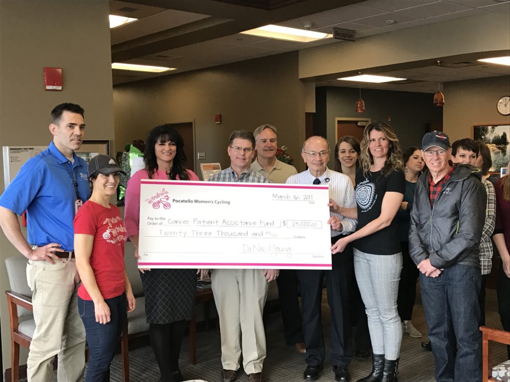 Portneuf Cancer Center staff being presented with a check by the Spinerella board members