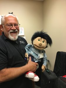 John Rainey and his therapy puppet